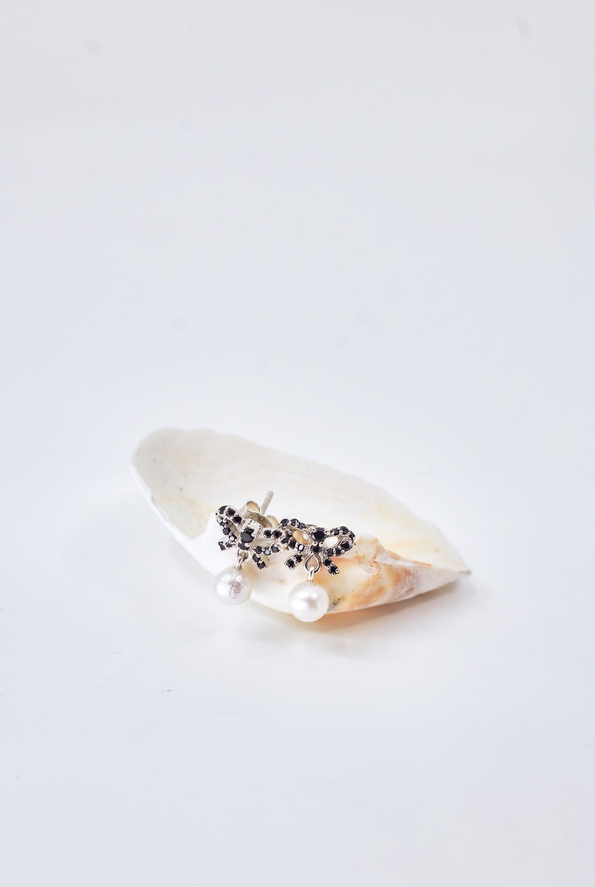 Black Diamond Pearl Bow Earrings Silver Drop